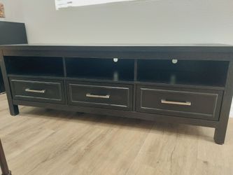 Entertainment Center with drawers and shelfs.