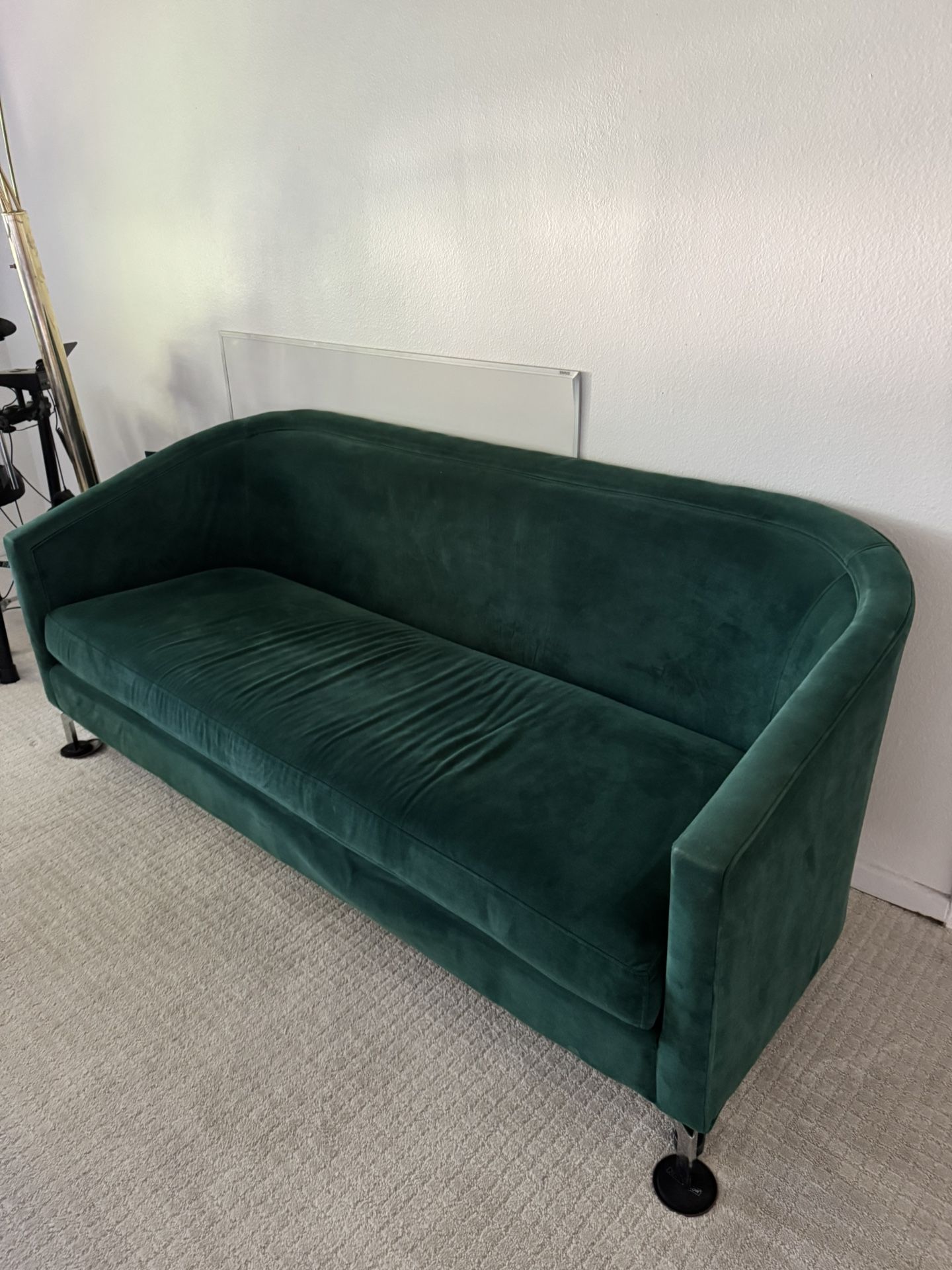 Green velvet sofa