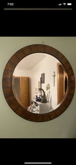 Circular wooden mirror