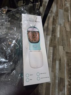 Dog leash with water bottle