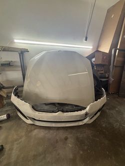BMW White Car Hood and Front Bumper Assembly