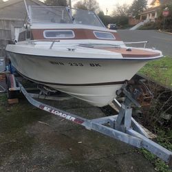  21’ Olympic Boat w/ Ez-loader trailer 