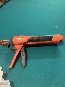 Hilti. Caulking Gun