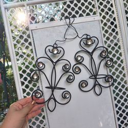 Pair of black metal scrollwork wall hanging decor sconces with crystals