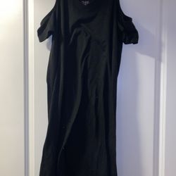 Black cold shoulder dress with a slight tear at the top Size Medium 