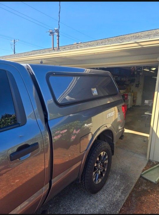 Nissan Titan XD Leer Canopy W/side Boxes.