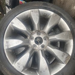 Three Infiniti wheels with tires  Pick up in orting 