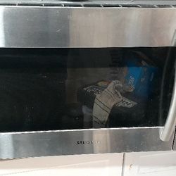 SAMSUNG OVER THE RANGE RANGE MICROWAVE. 