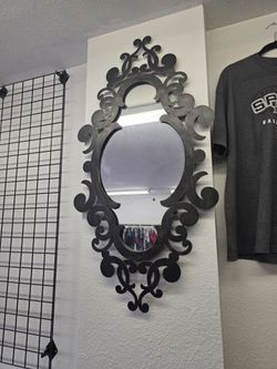 Elevate that whimsigoth space with this beautiful large alternative style metal mirror,