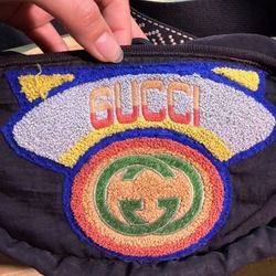 Gucci “LOVED” bum bag 