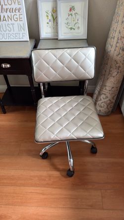 Silver leather swivel office chair wheels