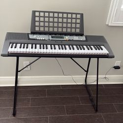 Yamaha EZ-200 Keyboard + Stand +music holder + power cable  