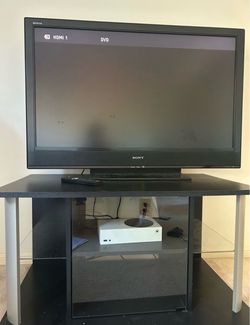 Sony  Bravia  42” TV and Cabinet