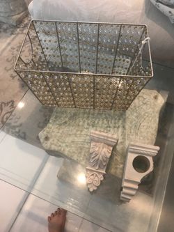 Wall sconce curtain hangers and decorative basket