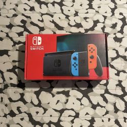 Nintendo Switch with Neon Blue and Neon Red Joy-Con