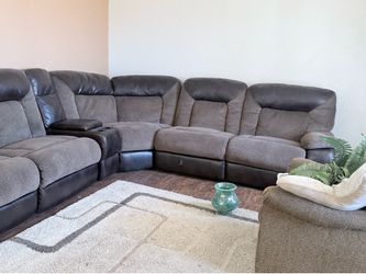 Sectional reclining sofa