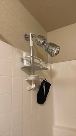 Assorted Bathroom Products, personal care products, and shower caddy