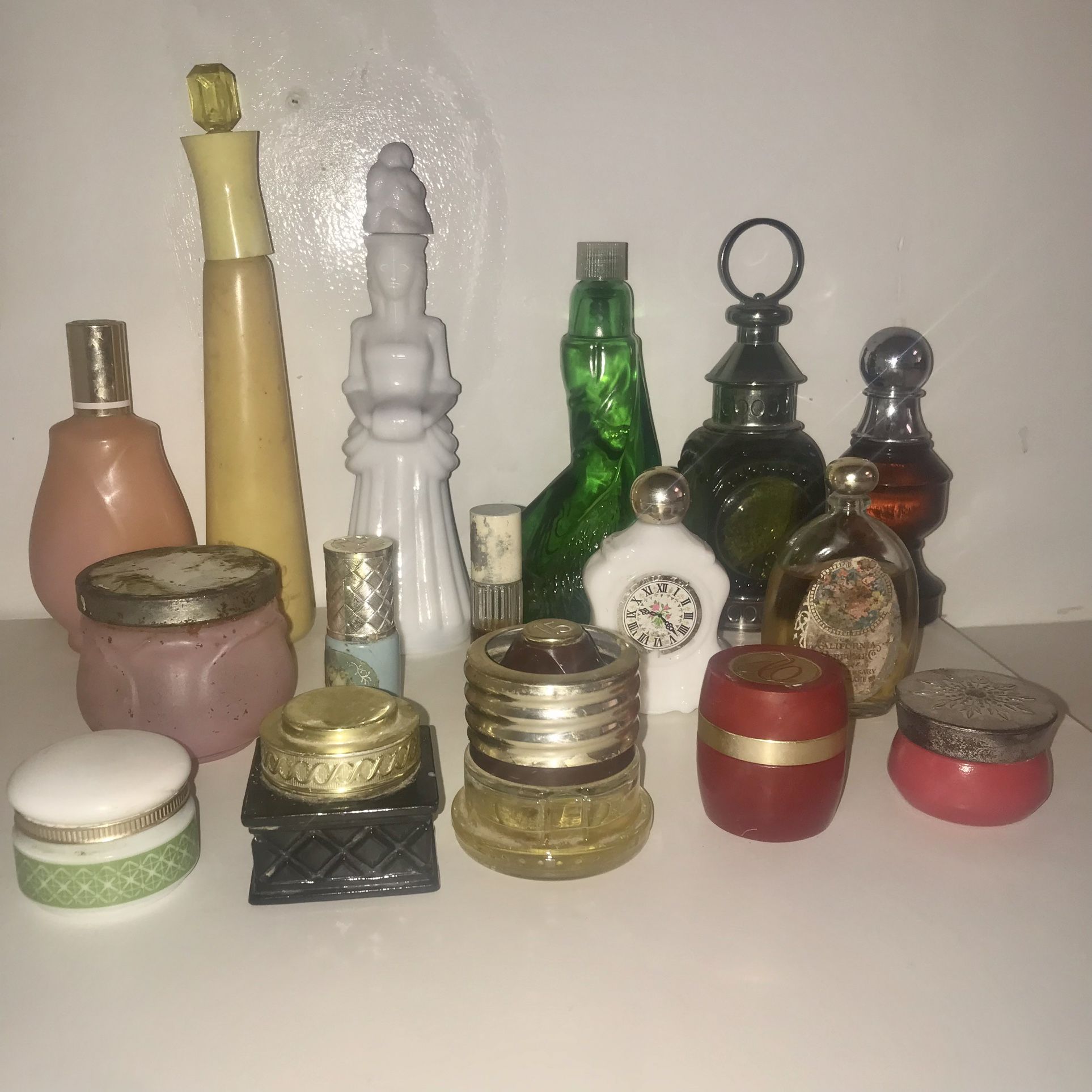 Assortment of Vintage Avon Perfumes, Colognes, & Powders