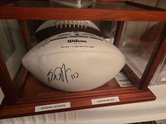 Autographed football of eagles greats desean Jackson and Lesean McCoy