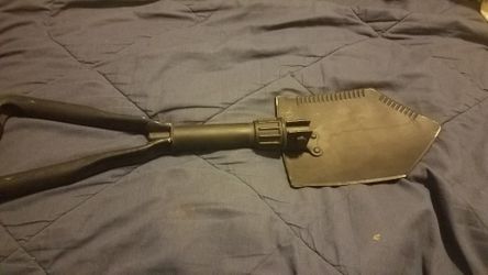 Army issued shovel fold- up .