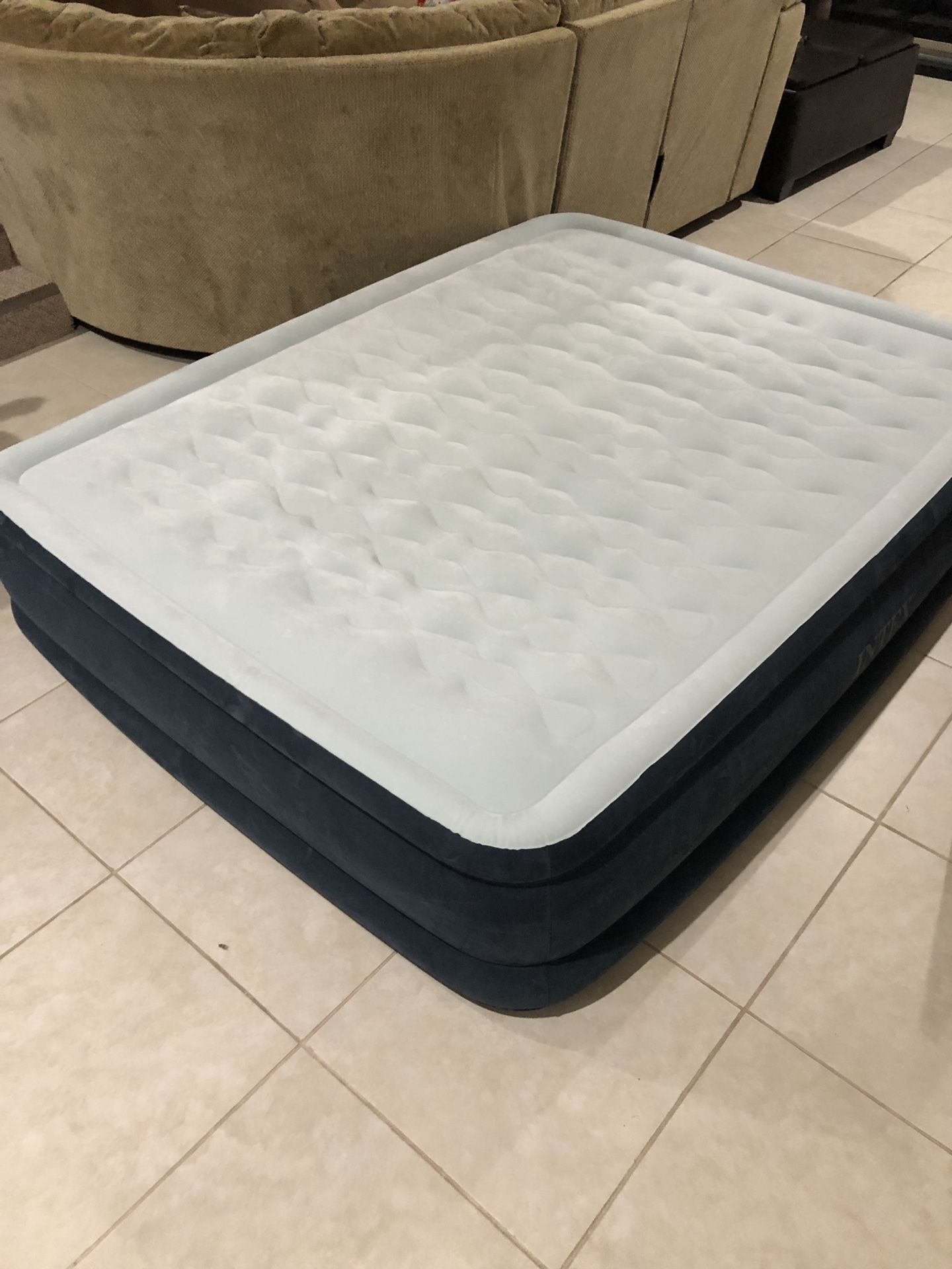 Intex inflatable mattress with built in pump 82” long, 61” wide
