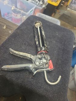 Caulking gun high force /low force barrel rotates