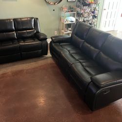 New Reclining Black Couch / Love Seat.  62x38x38H; 86x38x38H.  Free Delivery!