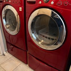 LG washer and dryer set with pedestals