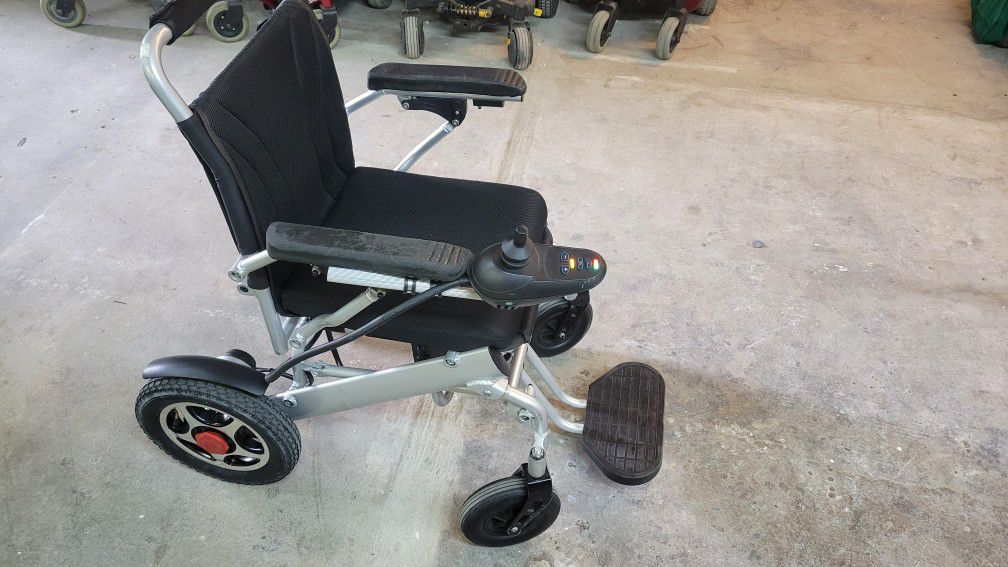 Folding power Wheelchair