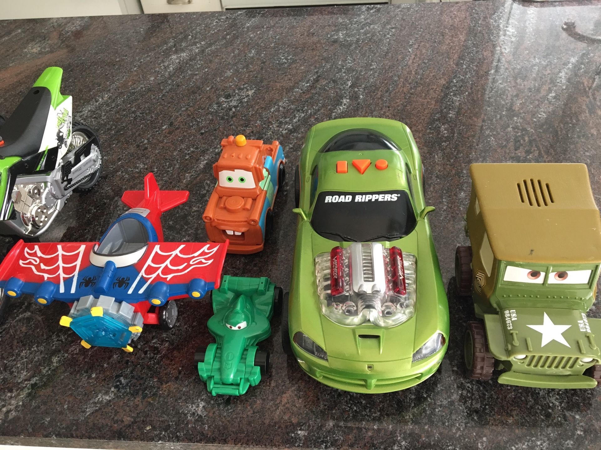 Toy trucks, cars, motorcycle and more