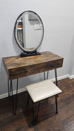 Vanity with lighted mirror and stool
