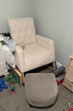 Cream colored rocking chair