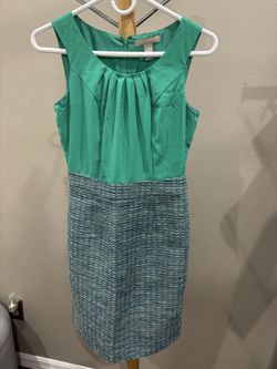 Banana Republic in green top with tweed skirt