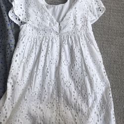 Three rompers and one dress