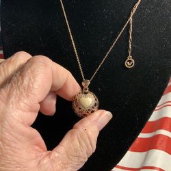 Victorian rose gold. Ball w/hearts necklace