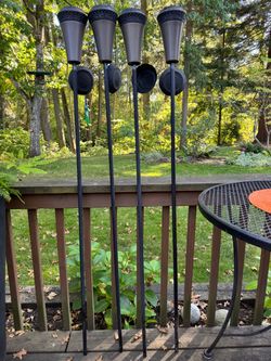 TIKI Metal Outdoor Torches – Set of 4
