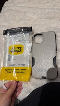 Grey and black otterbox iPhone 13pro