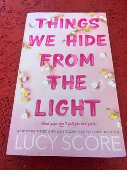 We Hide from the Light by Lucy Score!