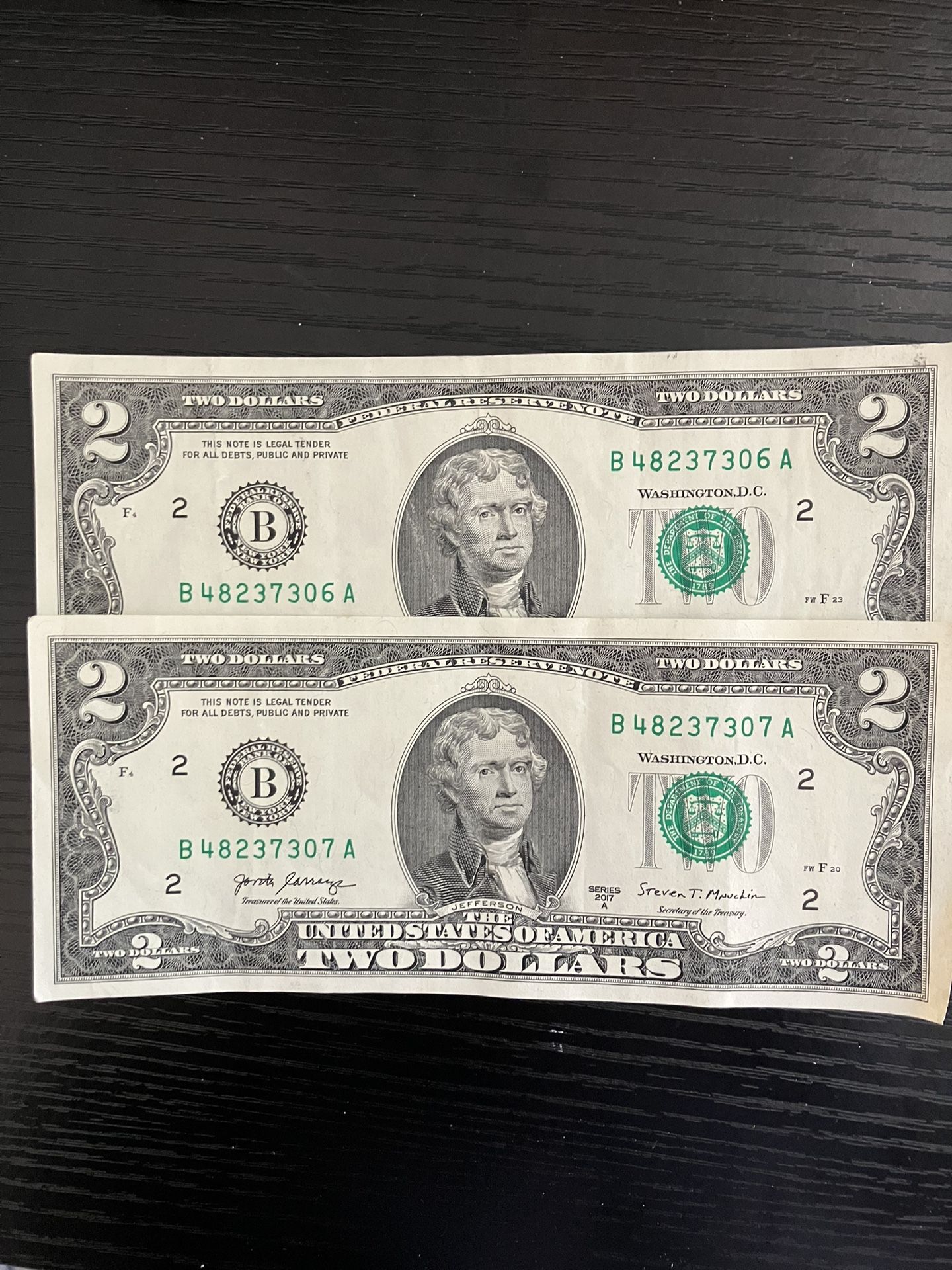 Two dollar bill /consecutive numbers/306.307