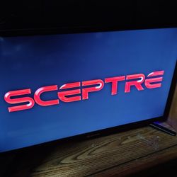 32in Spectre TV An Samsung Soundbar 