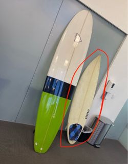 NME surfboard priced to sell surfboard on right