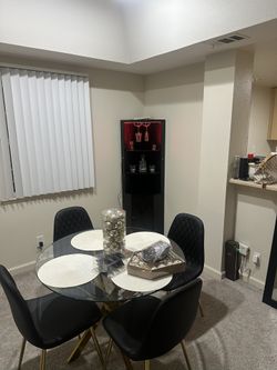 4 Person Round Table With Faux Leather Chairs