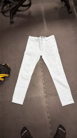 Light Wash Distressed Slim Fit Jeans