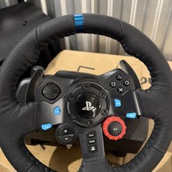 LogitechG29 Driving Force Race Wheel and Pedals with stand.