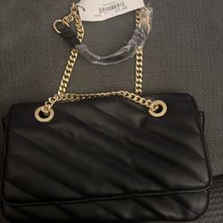 New with tags The Drop black purse with a gold chain strap