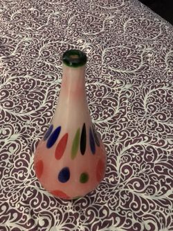 1 glass Vase , 1 red vase