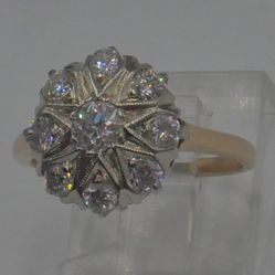14KT YELLOW GOLD RING SIZE 7 3.8 GRAMS W 9 DIAMONDS APPROXIMATELY  1 CARAT MINT. 882224-2. MINT CONDITION.  