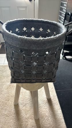 Grey storage basket.