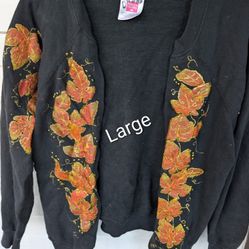 Womens Black Sweater With Orange Fall Leaves Trimmed In Gold Size Large 12-14 By Hanes. East Or West
(Sweatshirt Material) Not Made To Button. 50% Cot