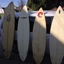 4 Surfboards With 2 Bags That Hold 3 